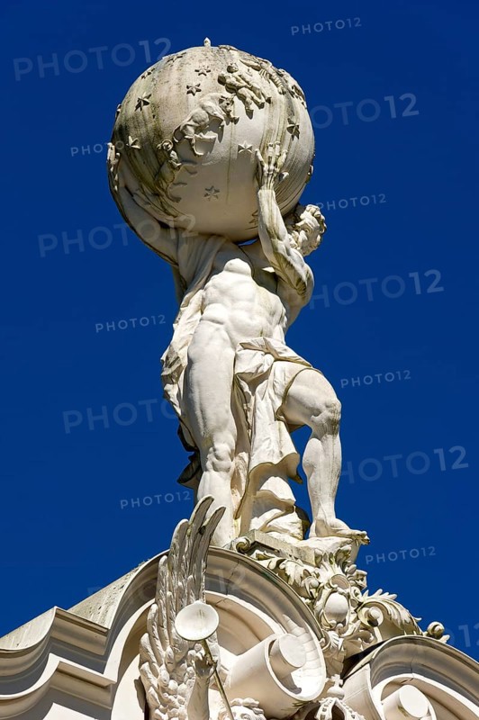 Statue of Atlas supporting the celestial sphere on the roof of Schloss Linderhof Palace