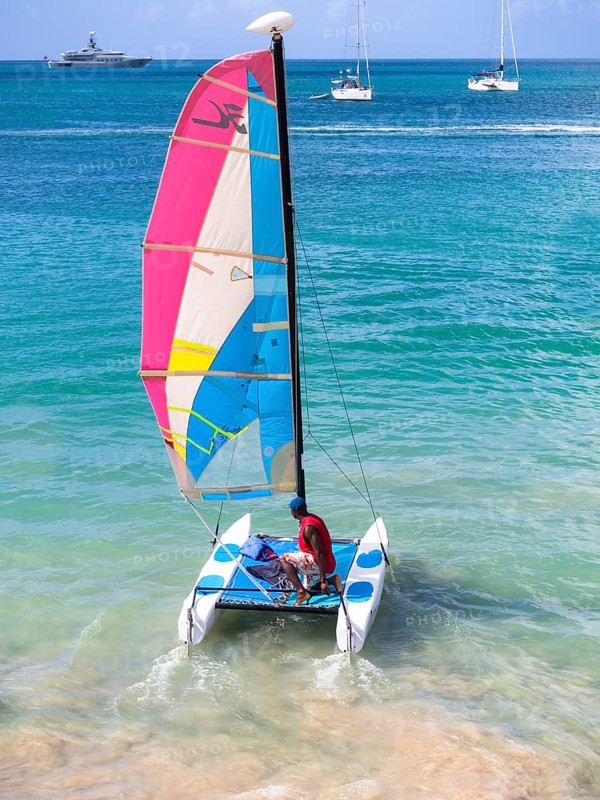 Catamaran leaving Rodney Bay