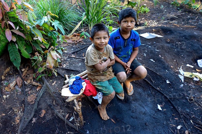 Two indigenous boys in the village of the Xavantes people