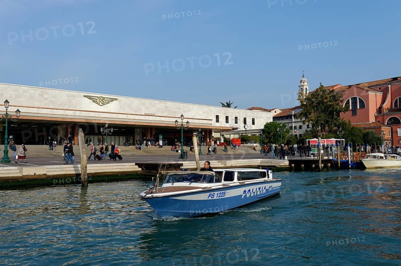 Police boat in front of the Santa Lucia train station