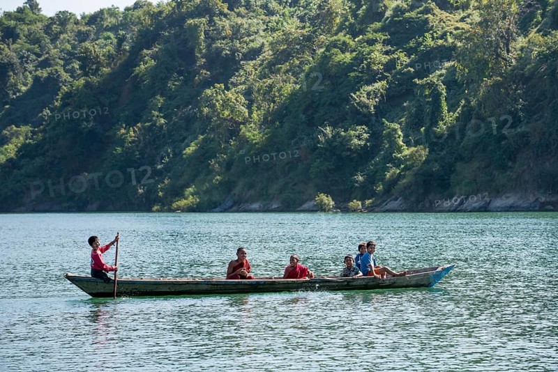 Children and novices in a boat on the Lemro River