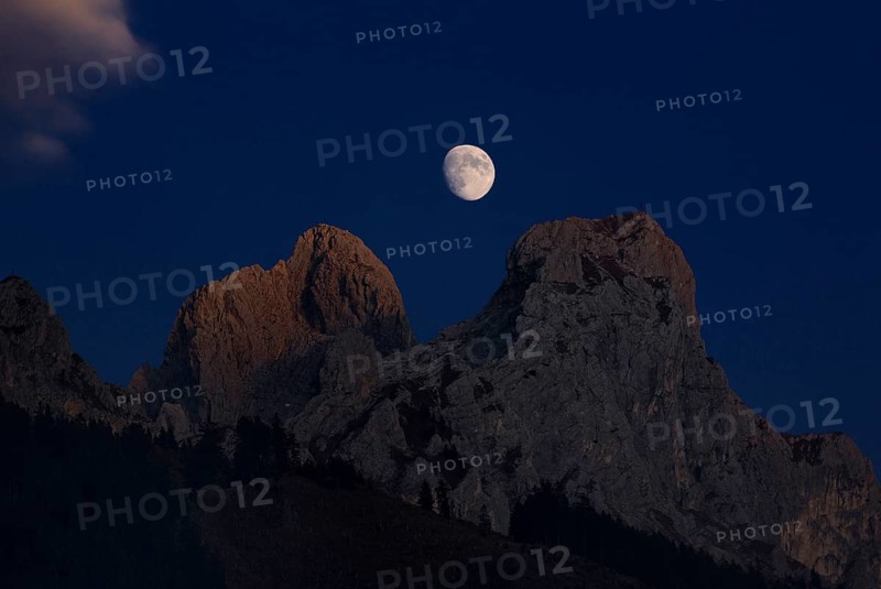 Waxing moon between Roten Fluh und Gimpel mountains in Tannheim Valley