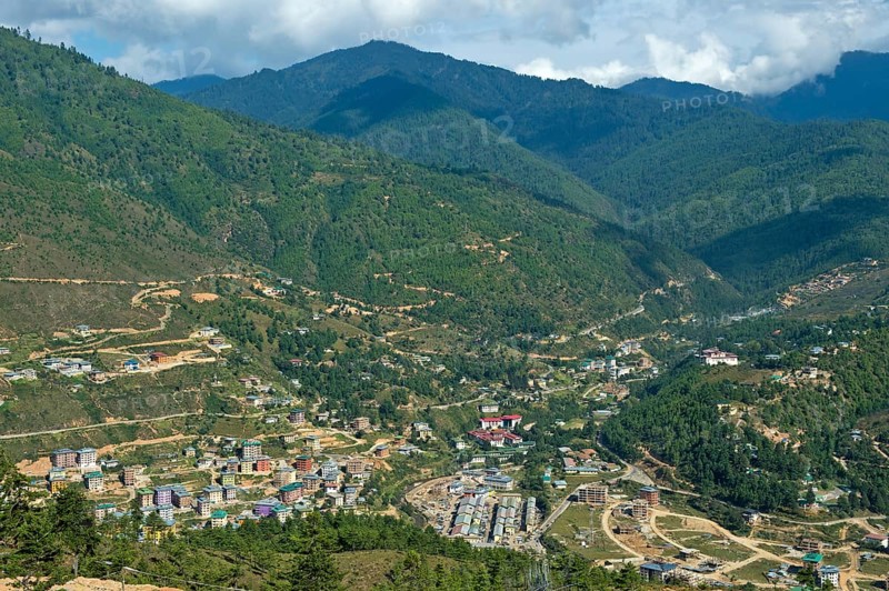 Construction of a new residential neighborhood on the outskirts of Thimphu as a result of rapid urbanization