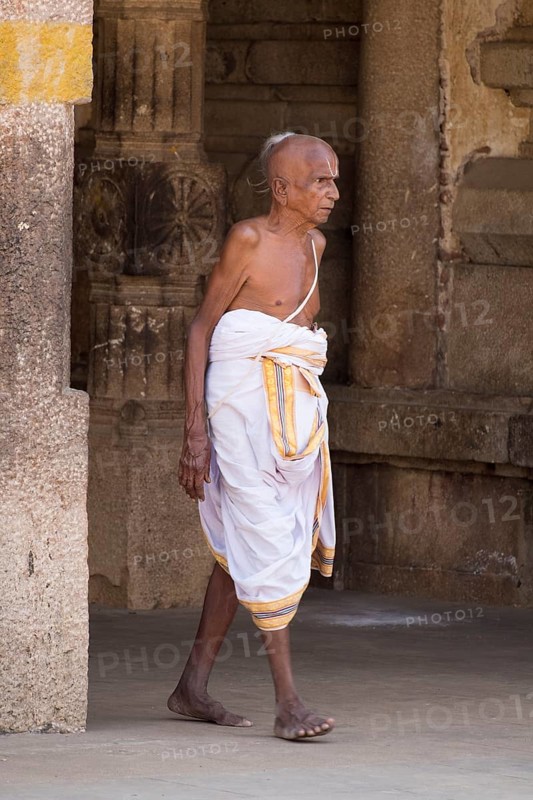 Elderly man wearing a robe