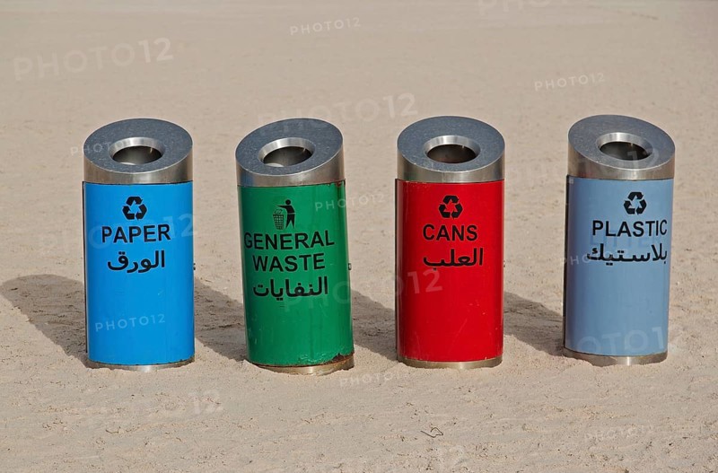 Rubbish bins for sorting waste on the beach at Corniche Road