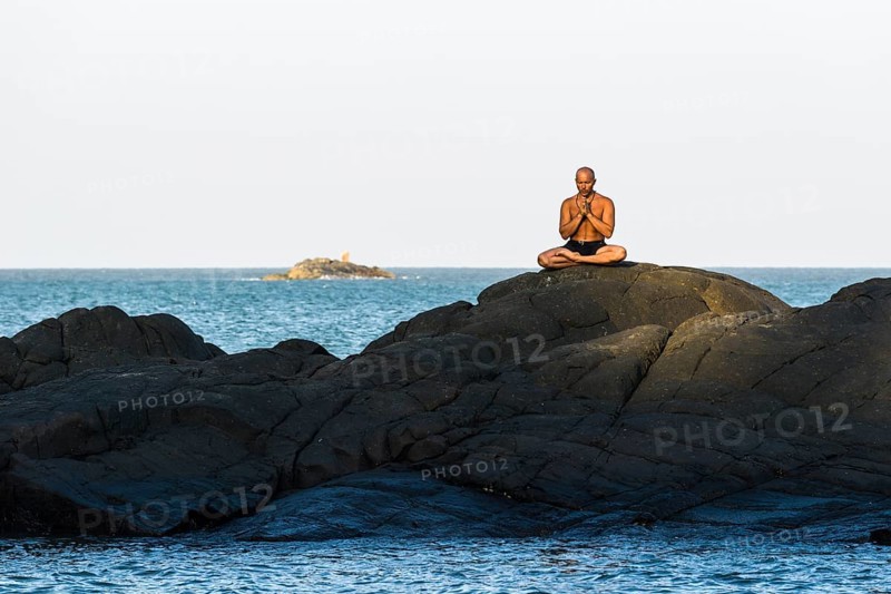 A man is meditating