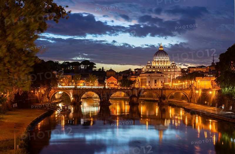 View from Ponte Umberto I across the Tiber River to Ponte Sant'Angelo and St. Peter's Basilica