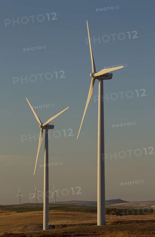 Windmills in the evening light on a wind farm near Sanlucar de Barrameda