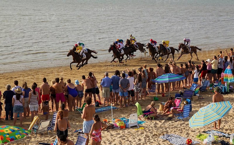 Horse race at the beach of Sanlucar de Barrameda at the Guadalquivir river mouth