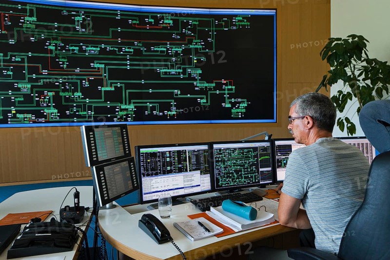 Engineer sitting at his work station in the Transmission Control Center