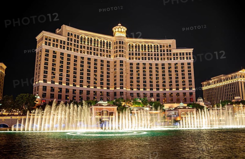 Illuminated fountain in front of the Bellagio Hotel at night