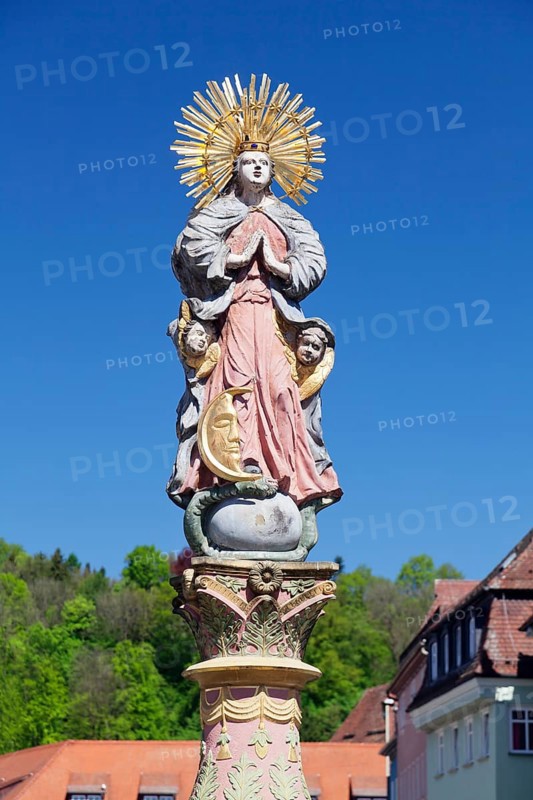 Madonna with a crescent moon on the Marienbrunnen fountain on Marktplatz square