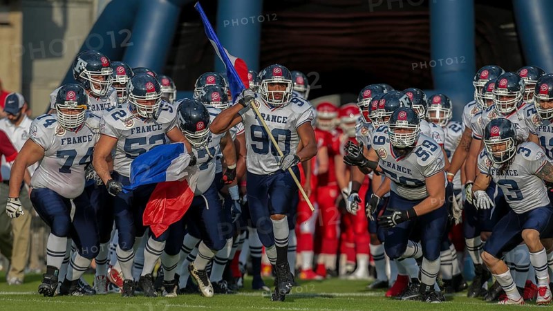 Team France running onto the field for their game against Denmark