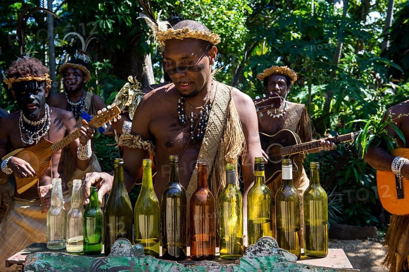 Group of traditional dressed men playing music
