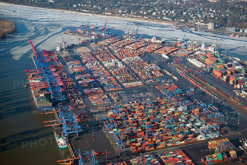 HHLA Container Terminal Burchardkai in winter with ice on the Elbe