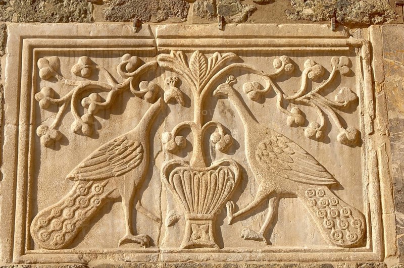 Carving of two peacocks on the facade of St Mark's Basilica