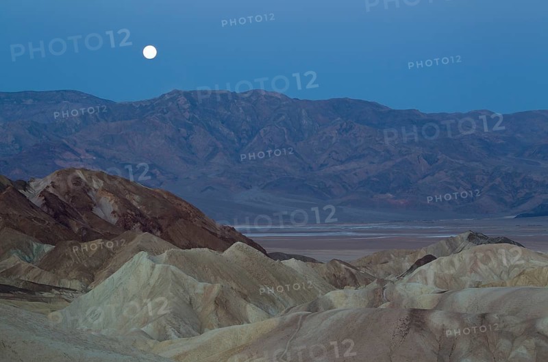 Full moon over the Panamint Range and the Death Valley at dawn