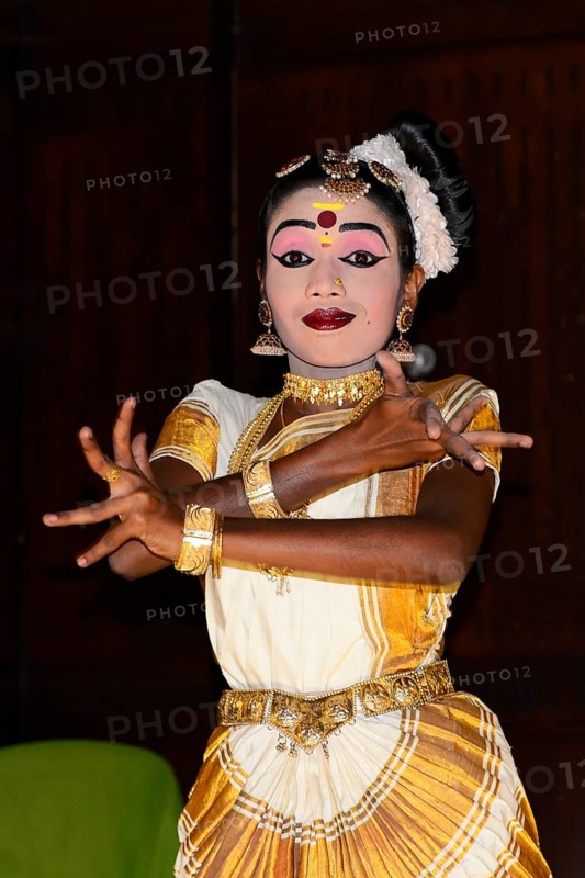 Fully made-up and costumed Kathakali dancer during a performance