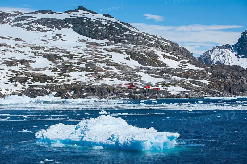Icebergs with a research station at the back
