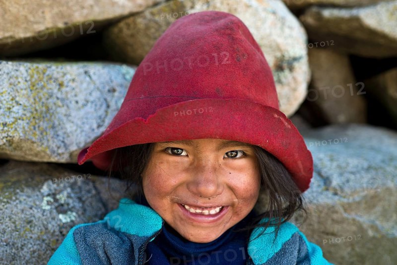 Smiling girl wearing a hat