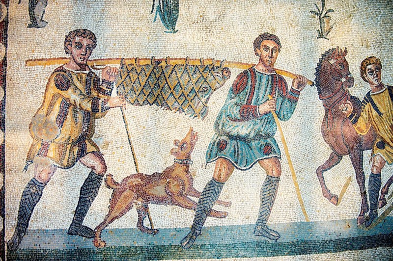Ancient Roman mosaic of hunters returning from the hunt