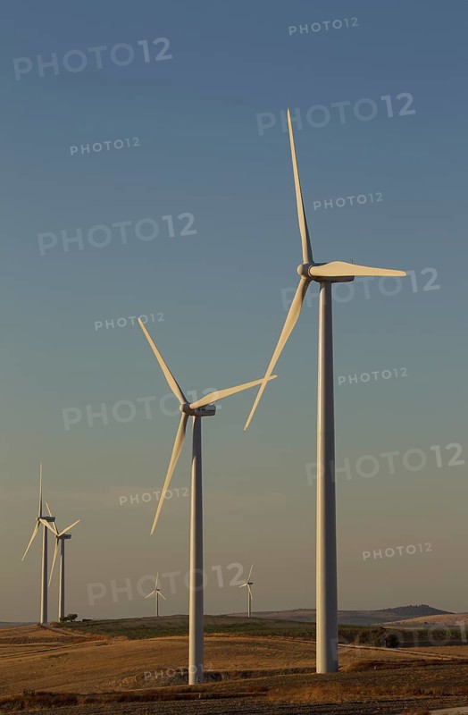 Windmills in the evening light on a wind farm near Sanlucar de Barrameda