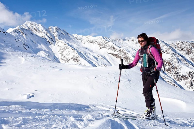 Cross-country skier ascending Wurzer Alpenspitz Mountain in the Ridnauntal Valley