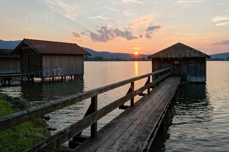 Boathouses at sunset on Lake Kochel