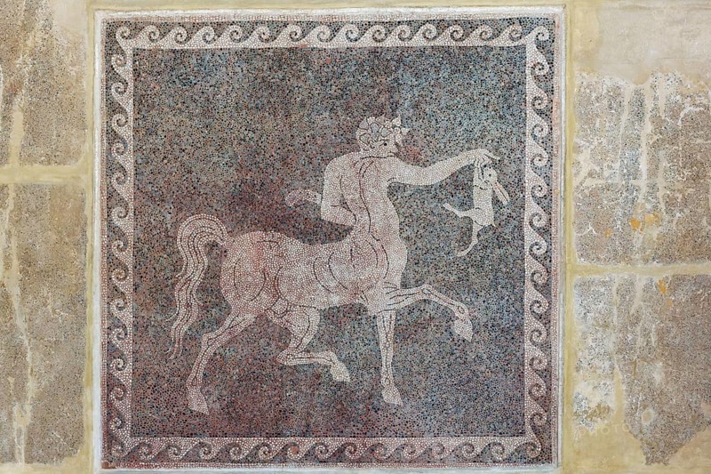 Centaur holding a slain rabbit