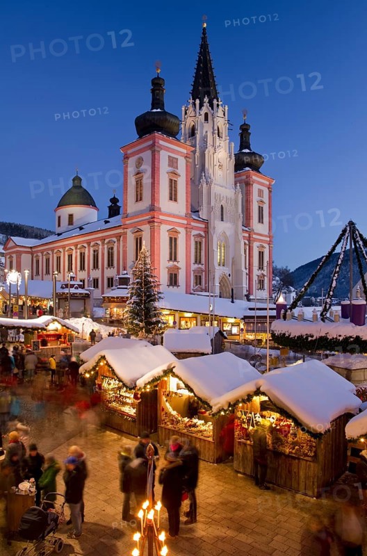 Christmas market in front of the Mariazell Basilica at the blue hour