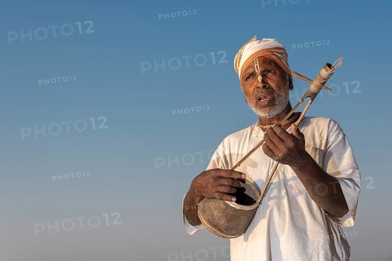 Musician playing an Ektara