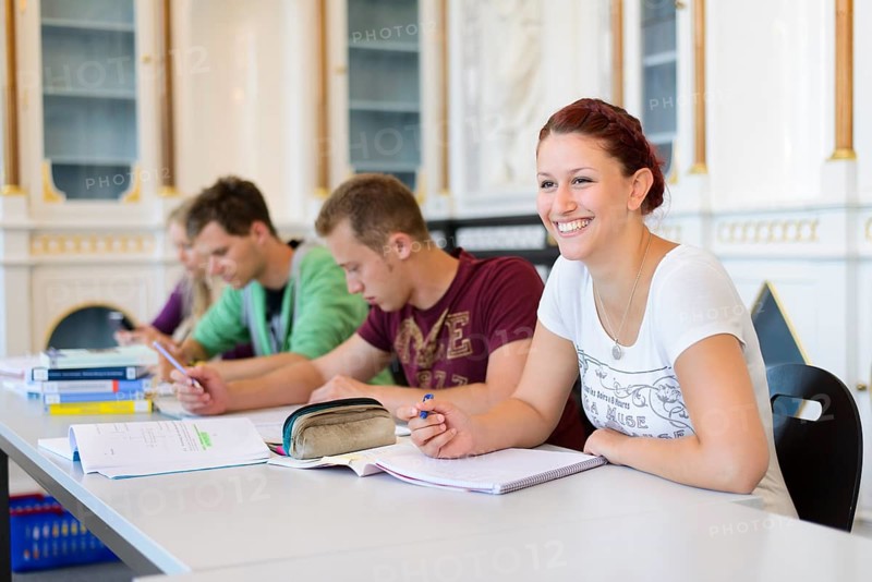 Students studying in the departmental library of the University of Hohenheim in Schloss Hohenheim Palace