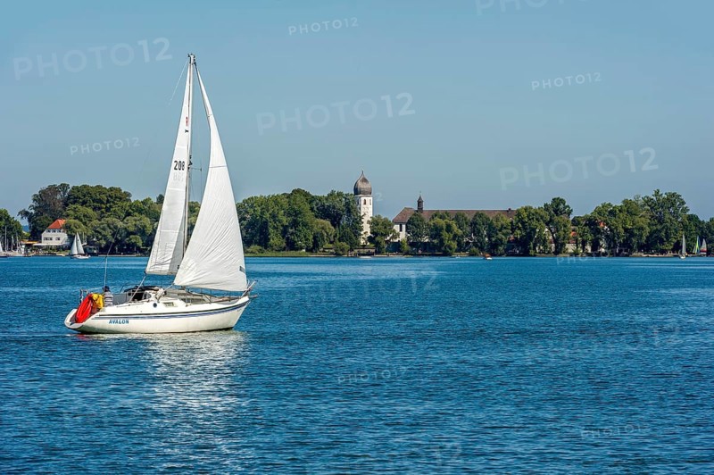 Sailboat in front of Frauenchiemsee Island
