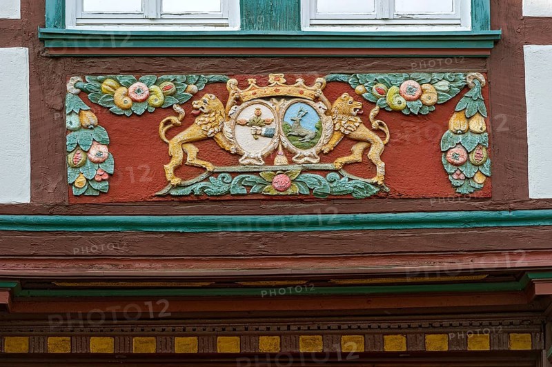 Wood carvings on the framework of the half-timbered house of the former inn 'Zum Goldenen Lowen'