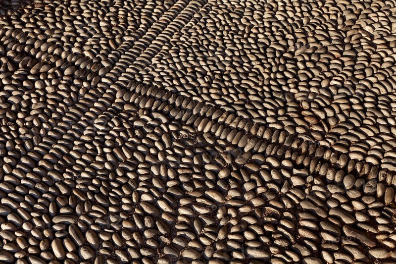 Pavement made from upright pebbles