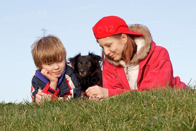 Boy and girl with a dog