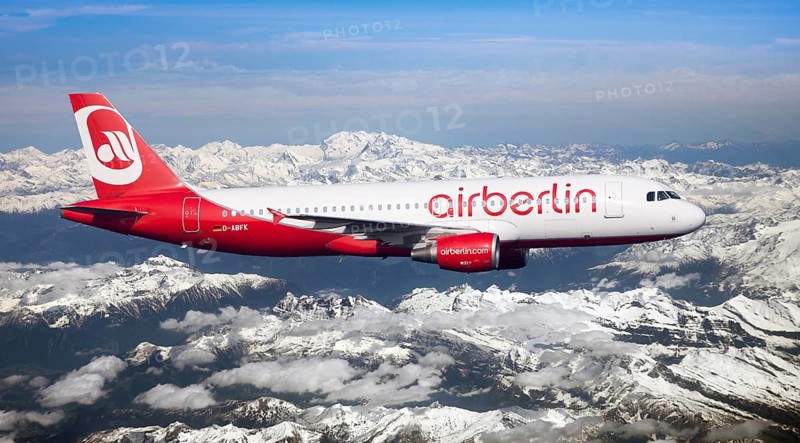 Air Berlin Airbus A320-214 in flight over the Alps