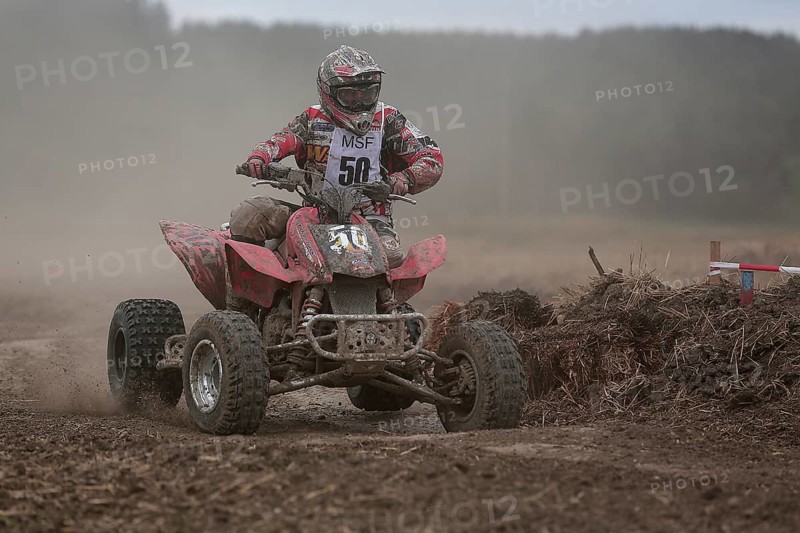 Quad rider on a field
