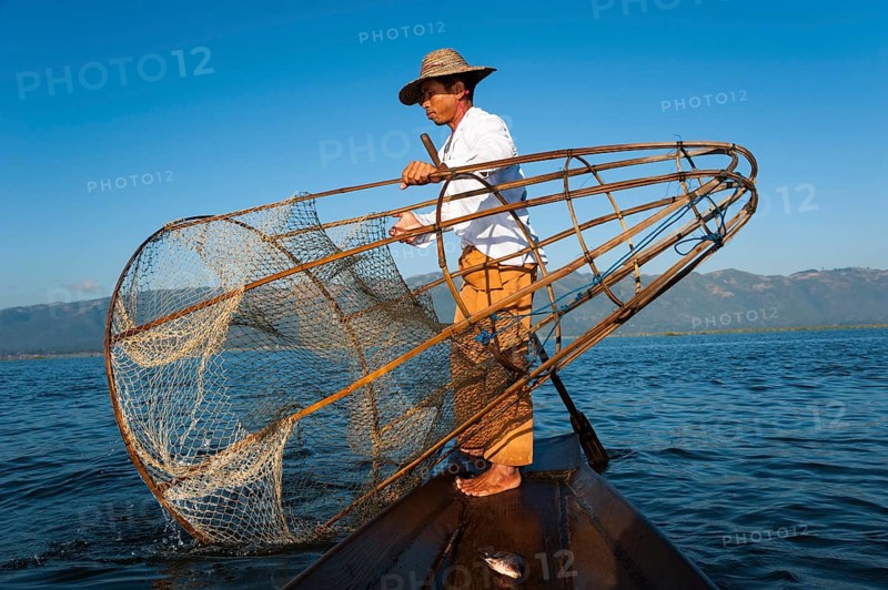 Fishermen with a traditional basket