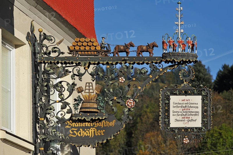 Ornate metal signboard of Brauerei-Gasthof Schaffler