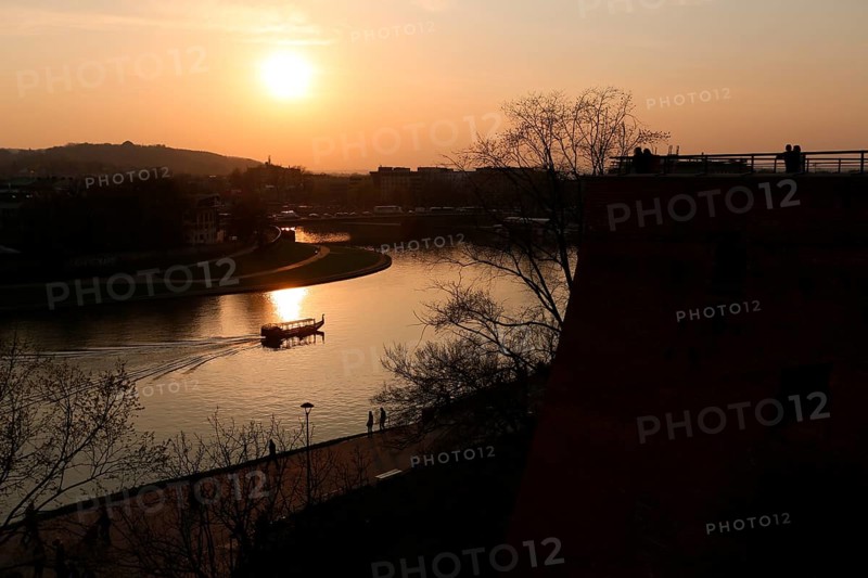 Sunset with boat on the Vistula River