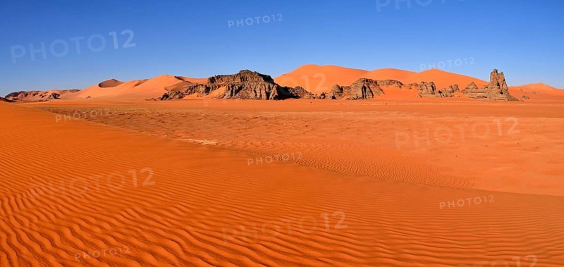 Sand dunes and rocks at Tin Merzouga