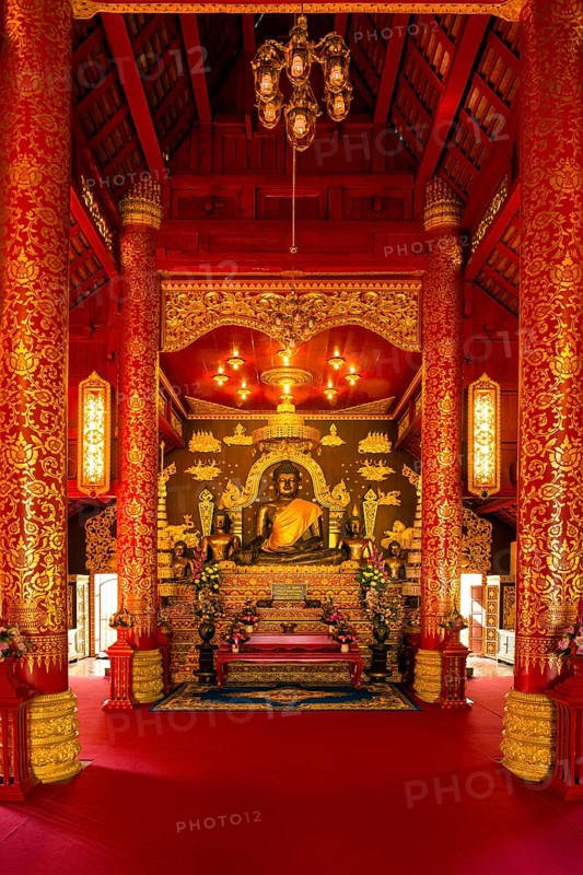 Historical bronze Buddha in the Viharn of Phra Kaeo