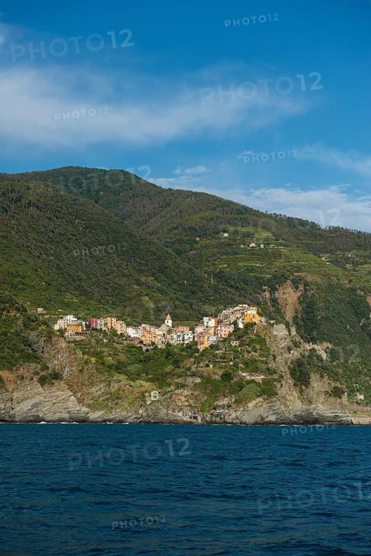 Village with colorful houses by the sea