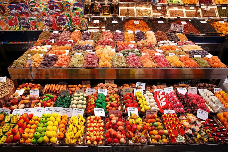 Market stall selling sweets and nuts