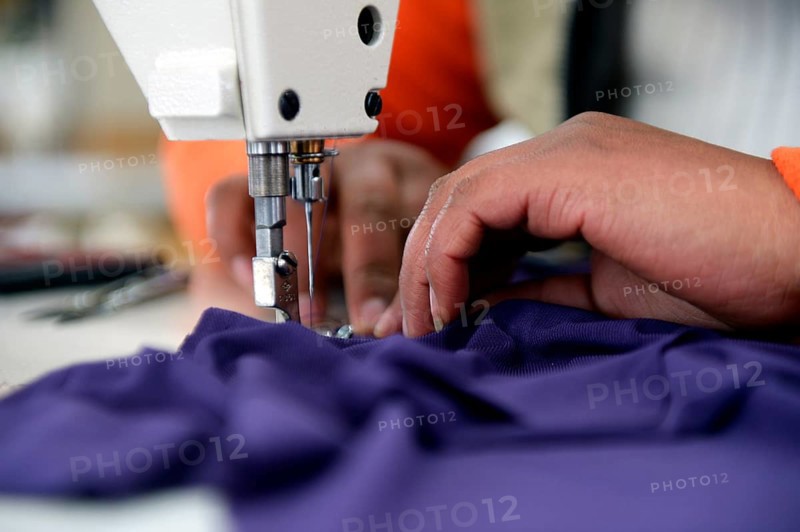 Seamstress working on a sewing machine