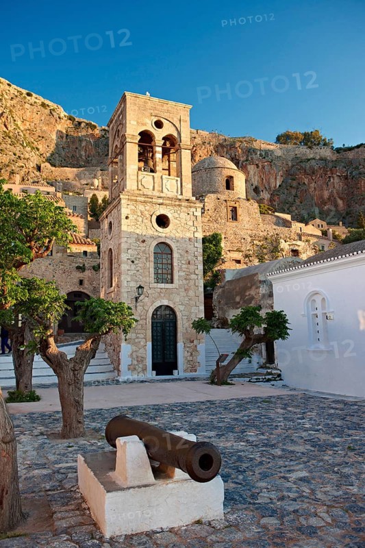 Main square of the lower town with the bell tower of the Byzantine Greek-Orthodox Church of Christ Elkomenos