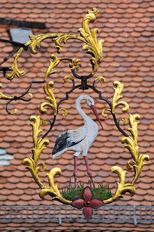 Hanging sign of the 'Zum Storchen' restaurant