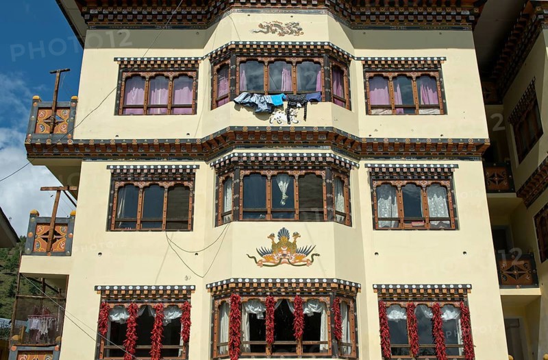 Facade of a residential building with a traditional fresco