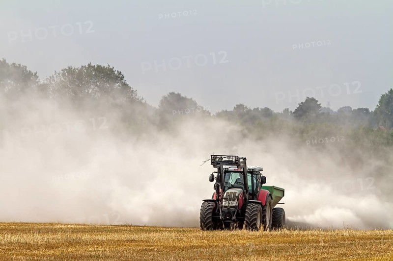 Tractor liming a field